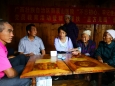 南溪山医院党员干部冒雨走访慰问乐江乡凉坪村贫困户